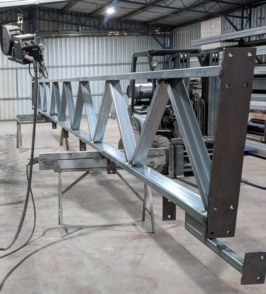 Web Trusses being fabricated in workshop